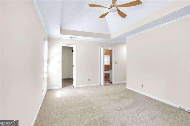 2830 Scottish Mill Way, Marietta, GA 30068 - unfurnished bedroom featuring a raised ceiling, carpet flooring, a spacious closet, ornamental molding, and ceiling fan