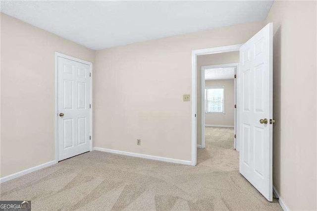 2830 Scottish Mill Way, Marietta, GA 30068 - unfurnished bedroom with light colored carpet and baseboards