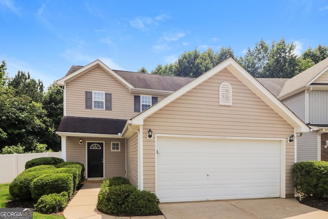 183 Arrowhead Dr, Dallas, GA 30132 - traditional-style house featuring a garage, driveway, and roof with shingles