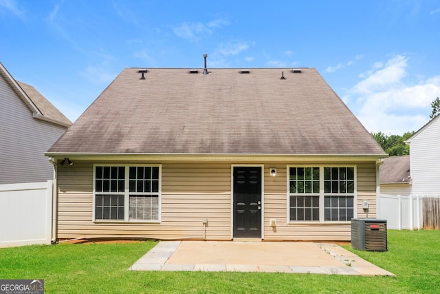 183 Arrowhead Dr, Dallas, GA 30132 - back of house with a patio and roof with shingles