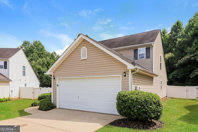 183 Arrowhead Dr, Dallas, GA 30132 - traditional-style home featuring a gate, concrete driveway, and a garage