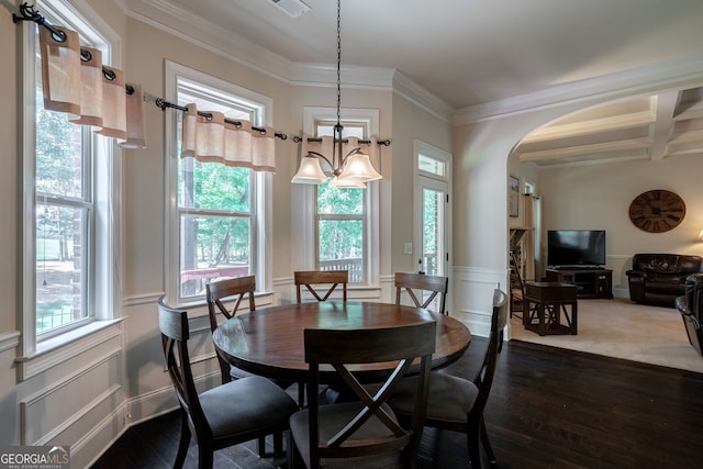 1221 Deer Trl, Bishop, GA 30621 - dining room with plenty of natural light, dark wood-style floors, ornamental molding, arched walkways, and wainscoting