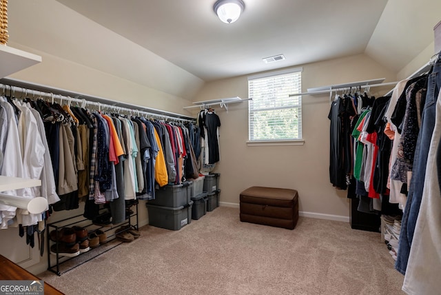 1221 Deer Trl, Bishop, GA 30621 - spacious closet featuring vaulted ceiling and carpet flooring