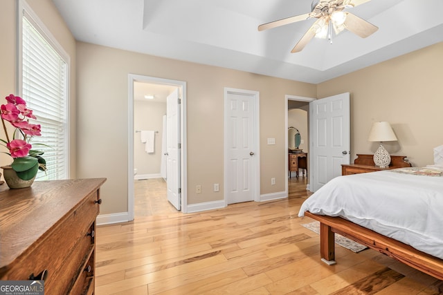 456 Timber Ct, Clarkesville, GA 30523 - bedroom with light wood-style flooring, ensuite bath, and ceiling fan