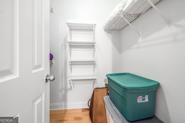 456 Timber Ct, Clarkesville, GA 30523 - walk in closet featuring wood finished floors