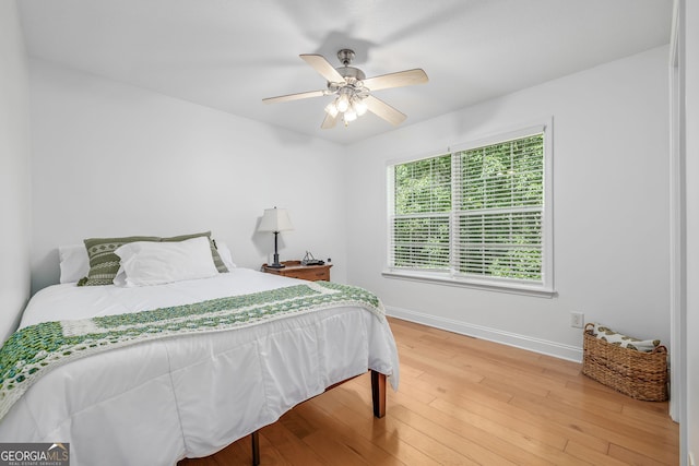 456 Timber Ct, Clarkesville, GA 30523 - bedroom with wood finished floors and a ceiling fan