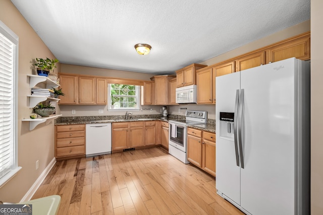 456 Timber Ct, Clarkesville, GA 30523 - kitchen featuring white appliances, open shelves, light wood-style flooring, dark stone counters, and a textured ceiling