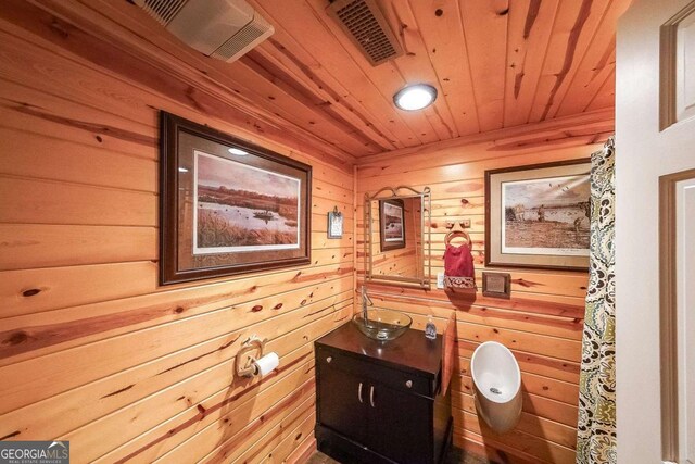 835 Timber Lake Trl, Cumming, GA 30041 - bathroom featuring wooden ceiling, vanity, and wooden walls