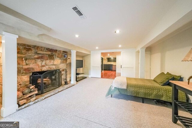 835 Timber Lake Trl, Cumming, GA 30041 - bedroom with a fireplace, carpet, and recessed lighting