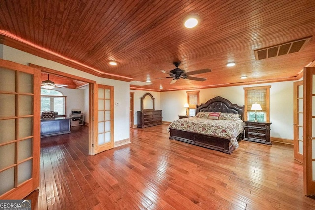 835 Timber Lake Trl, Cumming, GA 30041 - bedroom featuring wood ceiling, crown molding, hardwood / wood-style flooring, and french doors
