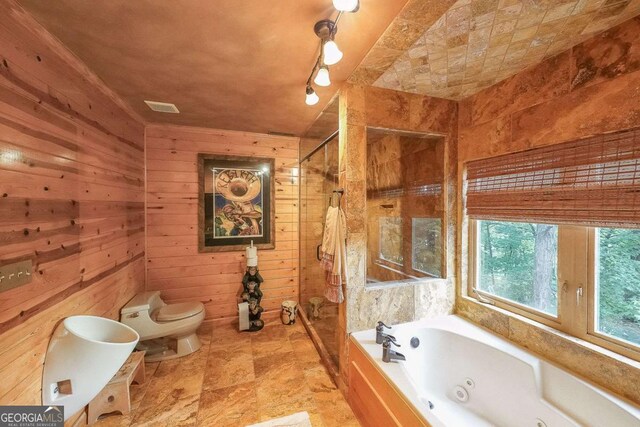 835 Timber Lake Trl, Cumming, GA 30041 - full bathroom featuring a shower stall, a jetted tub, and wooden walls