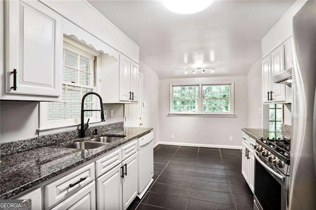 1819 King Alfred Dr SW, Atlanta, GA 30331 - kitchen featuring gas range, dishwasher, white cabinetry, and dark stone countertops