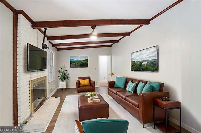 1819 King Alfred Dr SW, Atlanta, GA 30331 - living room featuring wood finished floors, beamed ceiling, and a fireplace