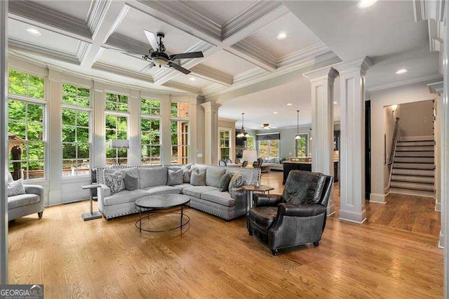 908 Basingstoke Ct, Suwanee, GA 30024 - living room with ornate columns, ornamental molding, a ceiling fan, beamed ceiling, and wood finished floors