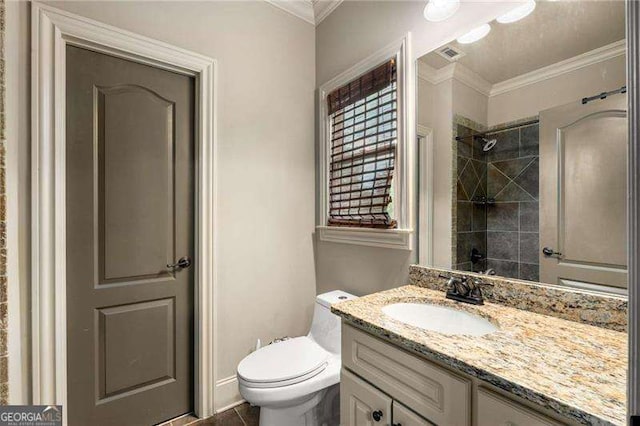 908 Basingstoke Ct, Suwanee, GA 30024 - bathroom featuring vanity, crown molding, and a tile shower