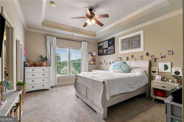 908 Basingstoke Ct, Suwanee, GA 30024 - bedroom featuring a tray ceiling, light carpet, ornamental molding, and a ceiling fan