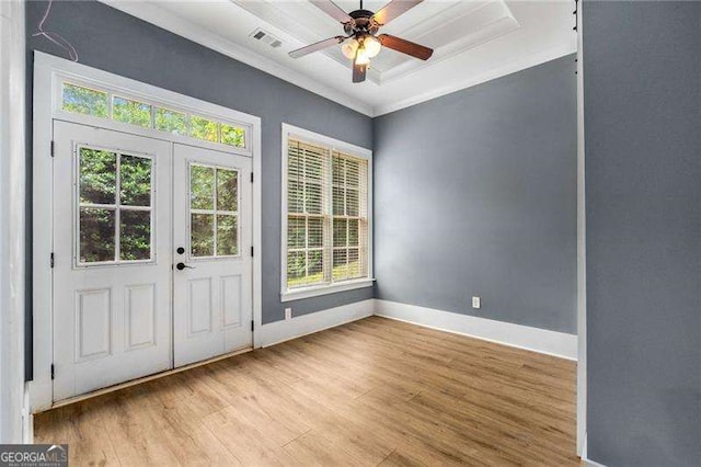 908 Basingstoke Ct, Suwanee, GA 30024 - foyer entrance with wood finished floors, healthy amount of natural light, ceiling fan, crown molding, and french doors