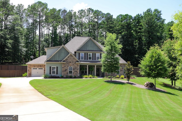 203 Drews Ridge Dr, Newnan, GA 30263 - craftsman house with concrete driveway, stone siding, a garage, board and batten siding, and view of scattered trees