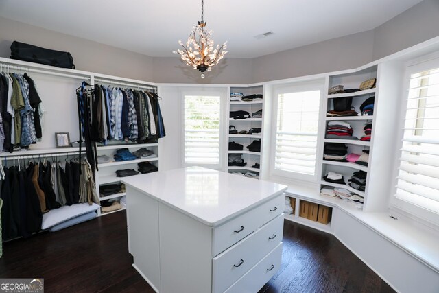203 Drews Ridge Dr, Newnan, GA 30263 - spacious closet featuring dark wood-style floors and a chandelier
