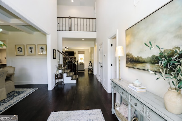 203 Drews Ridge Dr, Newnan, GA 30263 - entrance foyer featuring stairway, dark wood-type flooring, a ceiling fan, and beamed ceiling
