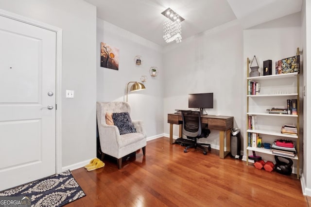 3040 Peachtree Rd NW Unit 702, Atlanta, GA 30305 - office area with wood finished floors and a chandelier
