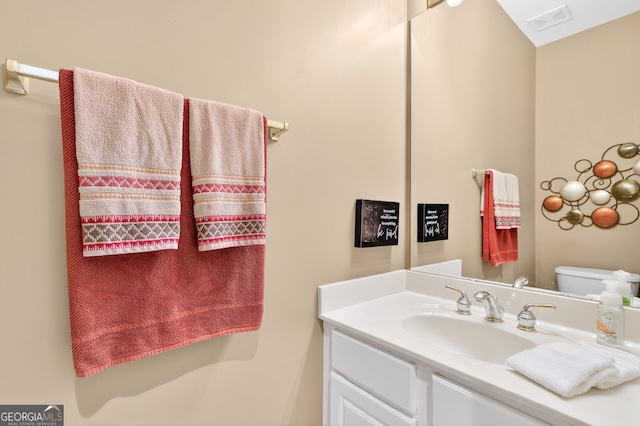 1065 Bookhout Dr, Cumming, GA 30041 - bathroom with vanity and toilet