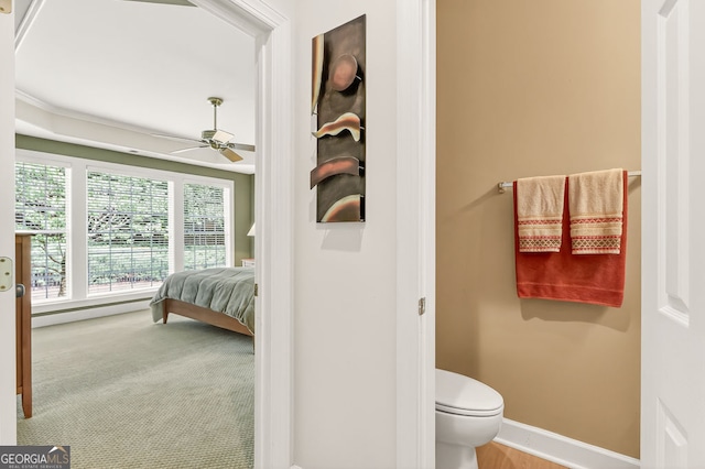 1065 Bookhout Dr, Cumming, GA 30041 - bathroom with a ceiling fan and toilet