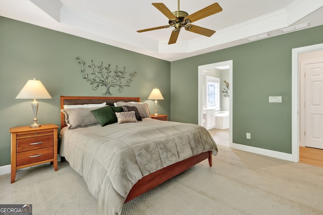 1065 Bookhout Dr, Cumming, GA 30041 - bedroom with a raised ceiling, carpet, connected bathroom, crown molding, and a ceiling fan