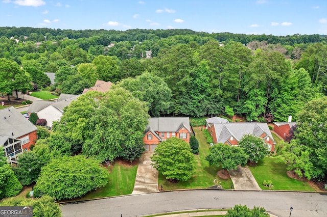 1065 Bookhout Dr, Cumming, GA 30041 - aerial view of residential area featuring a heavily wooded area