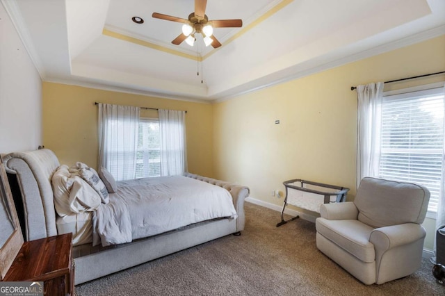 168 Gatlin Ridge Run, Dallas, GA 30157 - bedroom featuring a tray ceiling, crown molding, carpet floors, and a ceiling fan