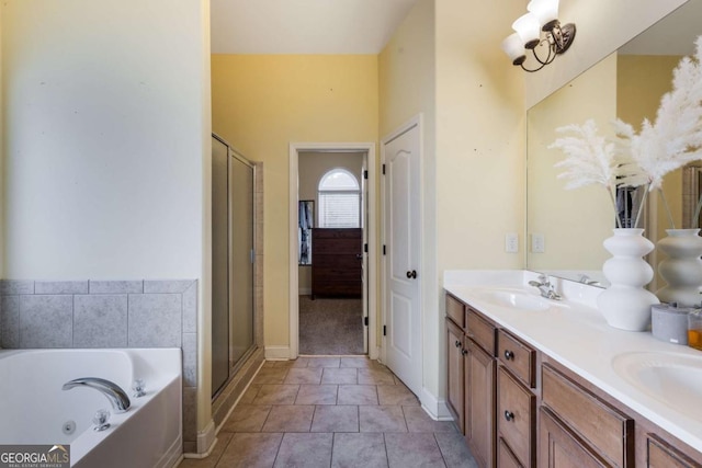 168 Gatlin Ridge Run, Dallas, GA 30157 - full bathroom featuring a whirlpool tub, double vanity, a stall shower, and tile patterned floors