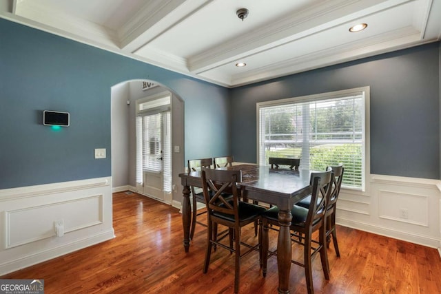 168 Gatlin Ridge Run, Dallas, GA 30157 - dining area featuring arched walkways, beamed ceiling, ornamental molding, wainscoting, and wood finished floors