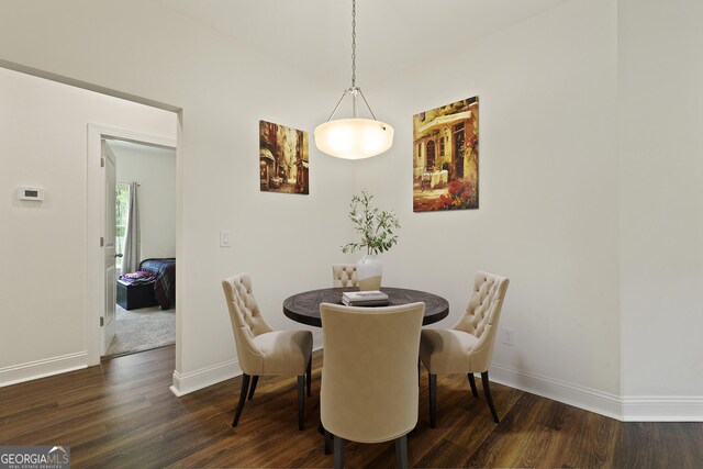 80 Rimmon Ct, Richmond Hill, GA 31324 - dining area with dark wood-type flooring