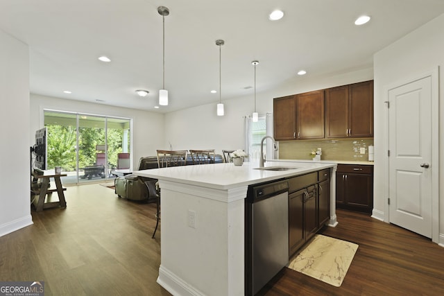 80 Rimmon Ct, Richmond Hill, GA 31324 - kitchen with dark wood-type flooring, plenty of natural light, light countertops, decorative light fixtures, and recessed lighting