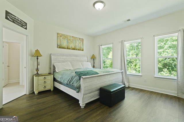 80 Rimmon Ct, Richmond Hill, GA 31324 - bedroom with dark wood-type flooring and baseboards