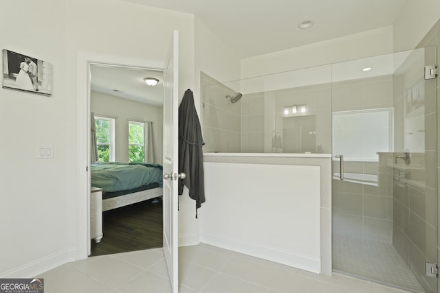 80 Rimmon Ct, Richmond Hill, GA 31324 - ensuite bathroom with a shower stall and tile patterned floors