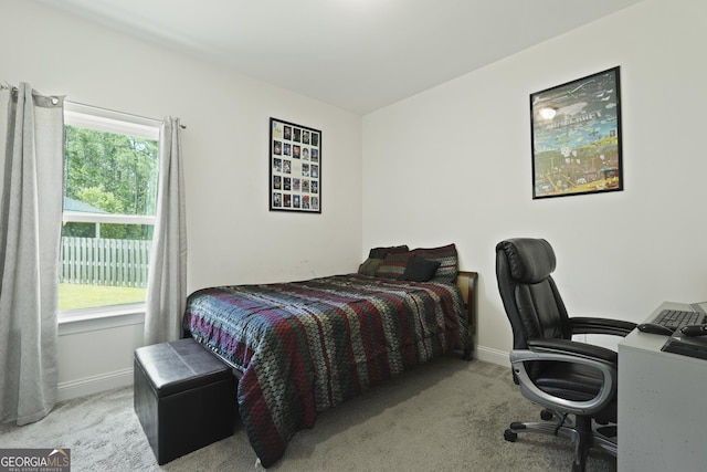 80 Rimmon Ct, Richmond Hill, GA 31324 - carpeted bedroom featuring a desk and baseboards