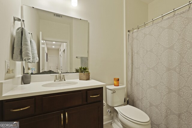 80 Rimmon Ct, Richmond Hill, GA 31324 - bathroom with vanity and toilet