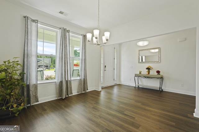 80 Rimmon Ct, Richmond Hill, GA 31324 - unfurnished dining area featuring a chandelier and dark wood-style flooring