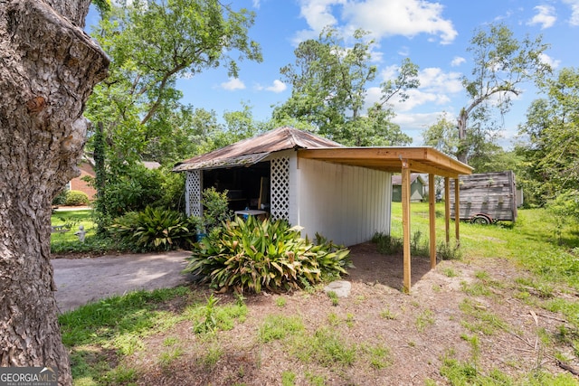110 College Blvd, Statesboro, GA 30458 - view of side of home with a carport