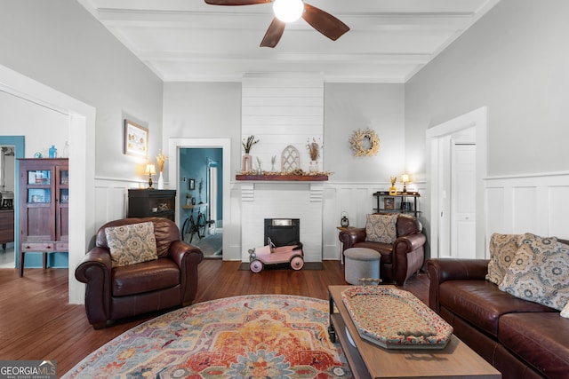 110 College Blvd, Statesboro, GA 30458 - living room with a fireplace, a decorative wall, ceiling fan, wood finished floors, and beam ceiling
