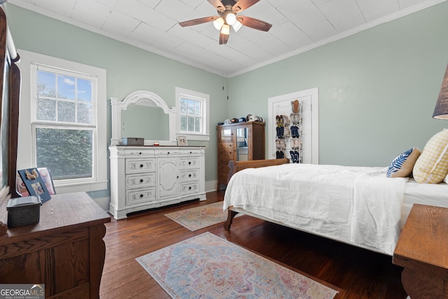 110 College Blvd, Statesboro, GA 30458 - bedroom featuring ornamental molding, wood finished floors, and a ceiling fan