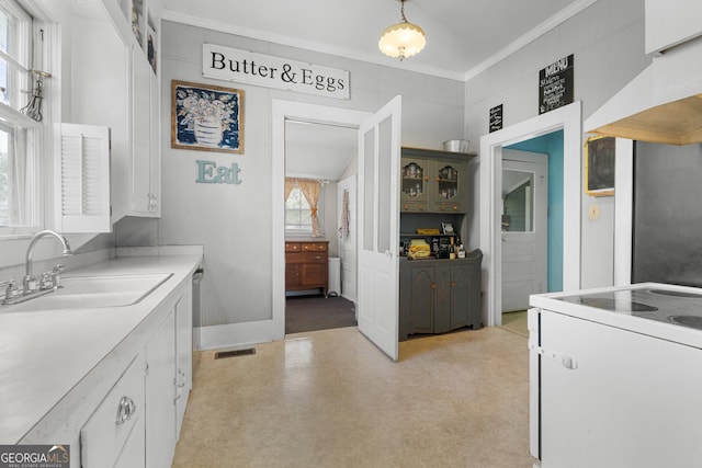 110 College Blvd, Statesboro, GA 30458 - kitchen featuring white electric range oven, custom range hood, white cabinets, crown molding, and light countertops