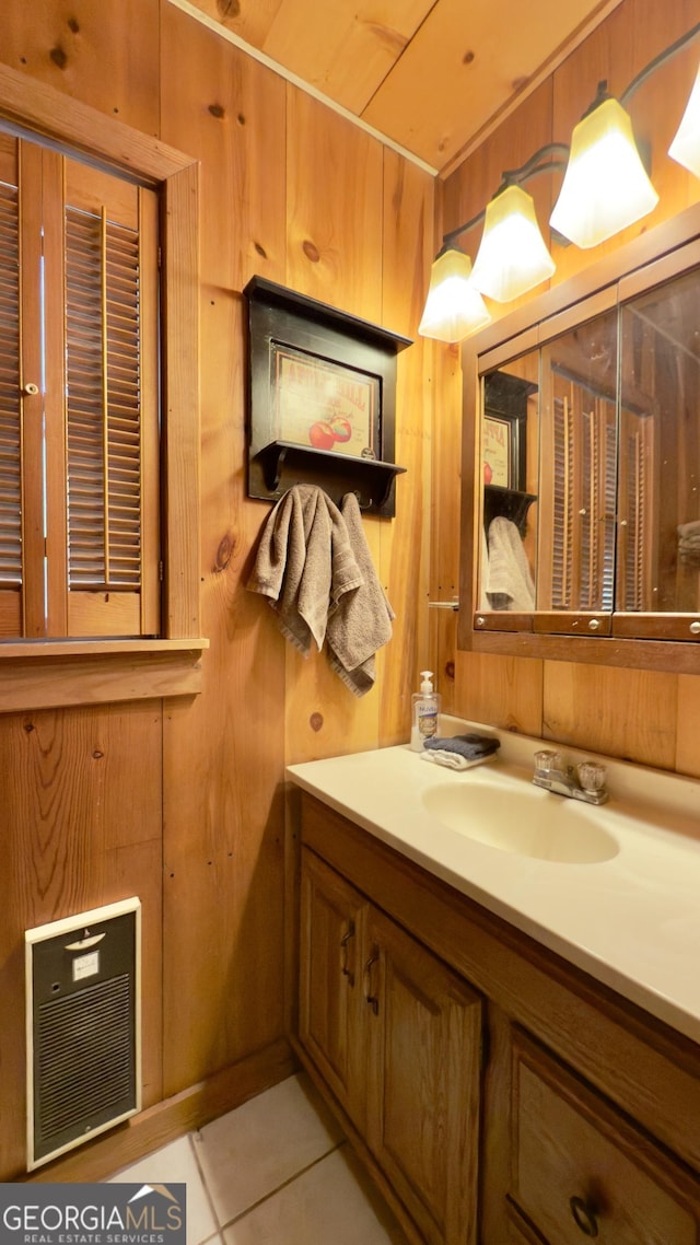 132 Wild Horse Cove Cir, Cleveland, GA 30528 - bathroom featuring tile patterned flooring, vanity, wooden walls, and heating unit