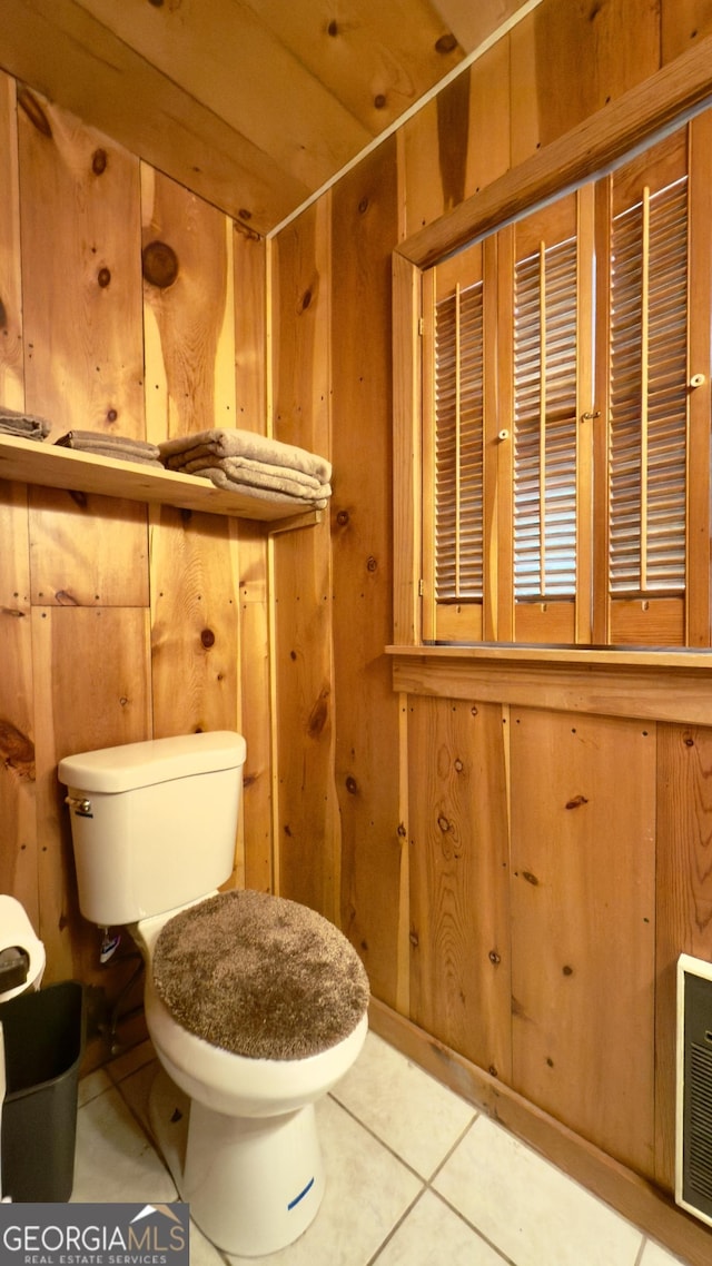 132 Wild Horse Cove Cir, Cleveland, GA 30528 - bathroom with wood walls and tile patterned flooring