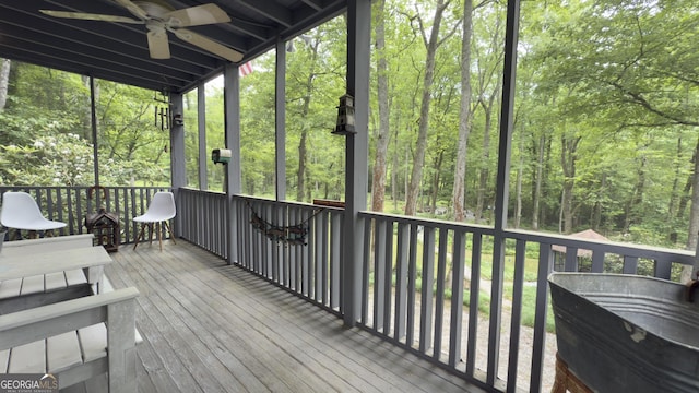 132 Wild Horse Cove Cir, Cleveland, GA 30528 - sunroom / solarium with ceiling fan and a forest view