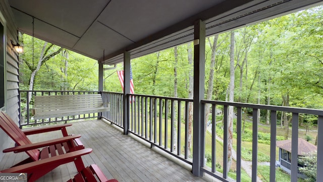 132 Wild Horse Cove Cir, Cleveland, GA 30528 - deck featuring a wooded view