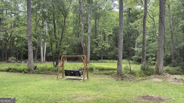132 Wild Horse Cove Cir, Cleveland, GA 30528 - view of grassy yard featuring a view of trees