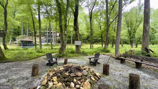 132 Wild Horse Cove Cir, Cleveland, GA 30528 - view of patio / terrace featuring an outdoor fire pit