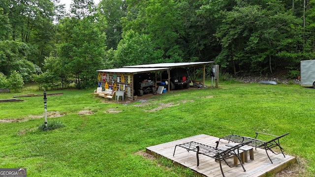 132 Wild Horse Cove Cir, Cleveland, GA 30528 - view of grassy yard with a carport, a pole building, and an outbuilding